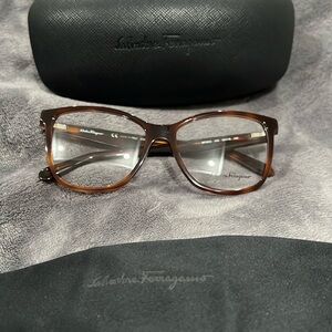 Salvatore Ferragamo Glasses. Serial number: SF2903.